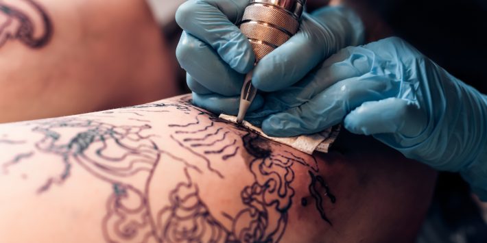 tattoo, tattoo aftercare, tattoo artist, tattoo in process, tattoo gun,