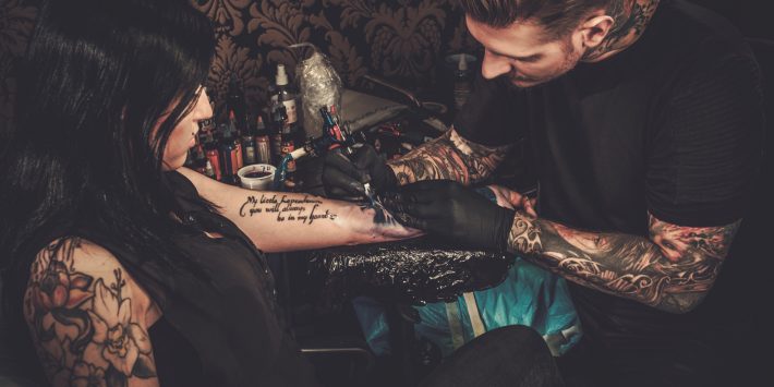 tattoo artist, tattoos, tattoo style, man with tattoos, tattooed man, tattooed girl, tattoo gun, tattoo in process,